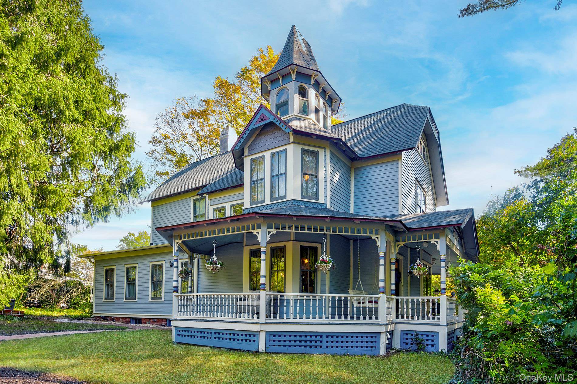 Step into timeless elegance at 150 Ocean Avenue, Northport, a Queen Anne Victorian designed by renowned architect George F.