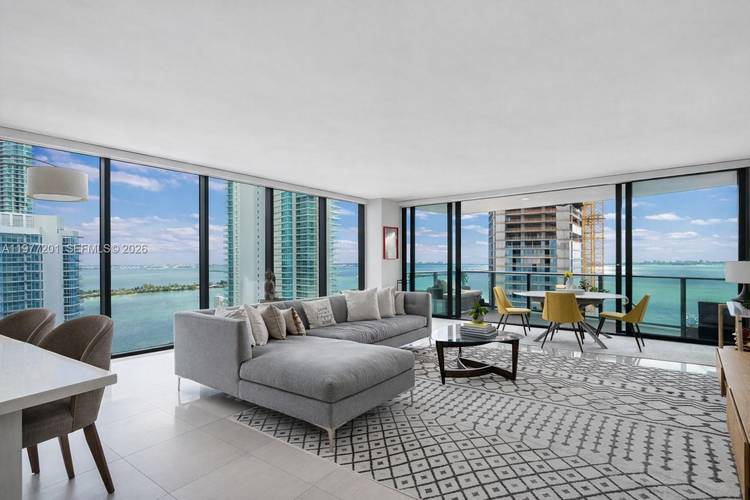 A private elevator opens directly into this bright corner residence featuring 2 bedrooms, 2 bathrooms, and a spacious Den, offering a versatile layout designed for both comfort and style.