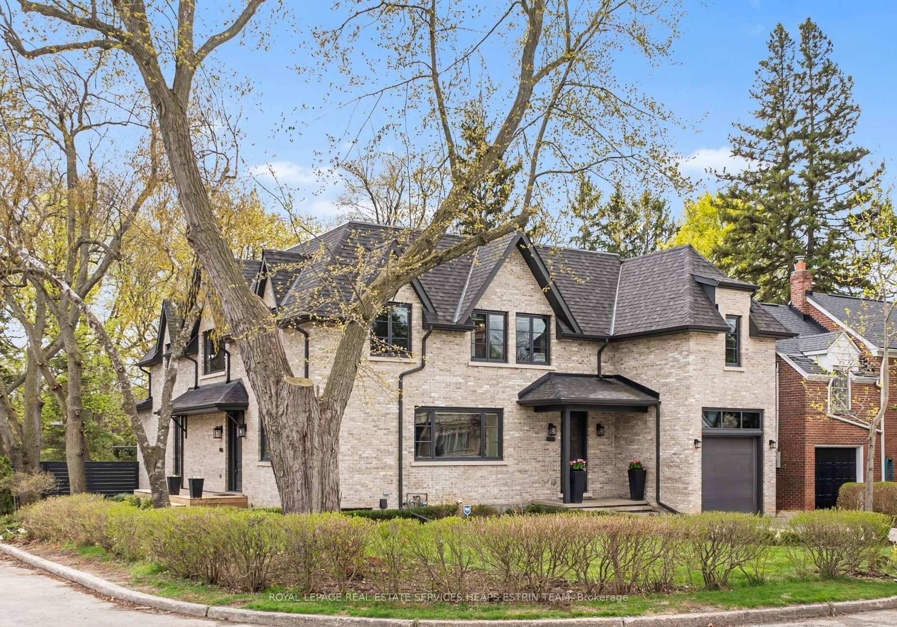 Welcome to this exceptional custom built residence in prestigious Bennington Heights, where warm California inspired design meets modern family living.