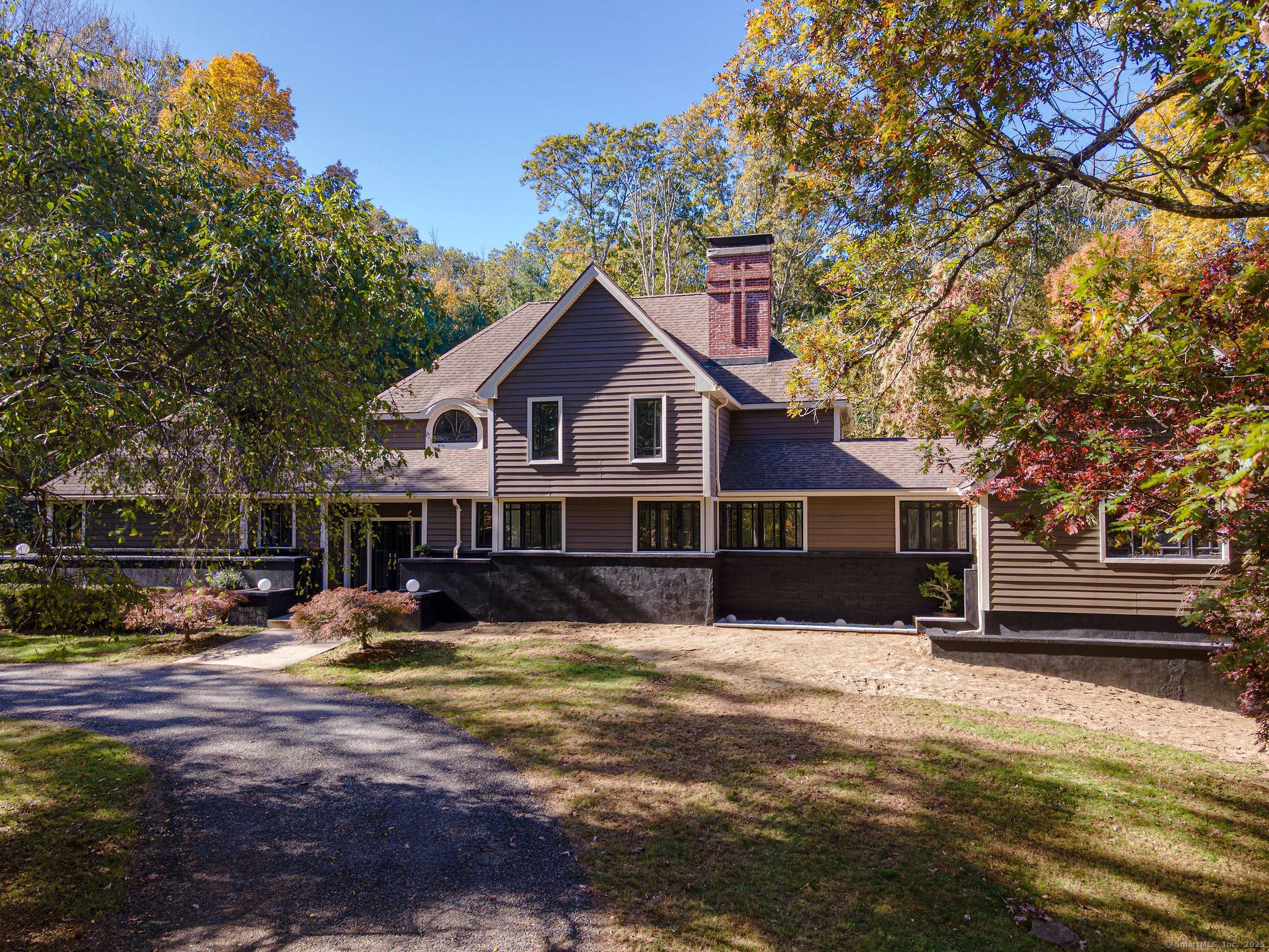 Beautiful 4 bedroom, 4 bath, 3739 sq ft contemporary home in a private setting on 10 acres.