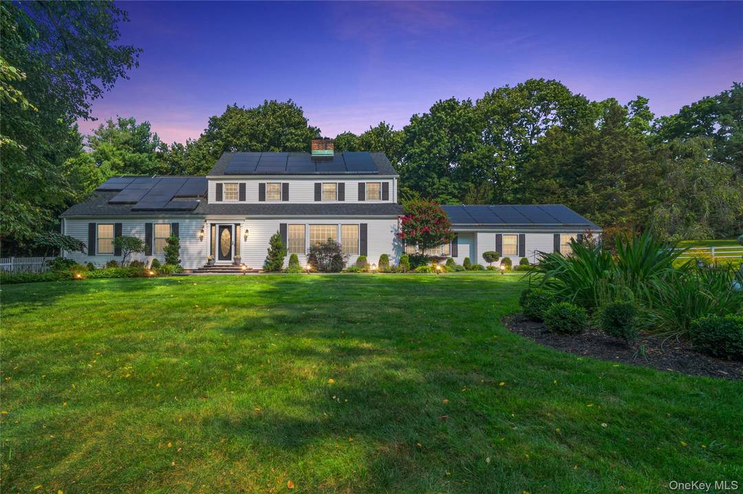 Welcome to this magnificent amp ; elegant Center Hall colonial !