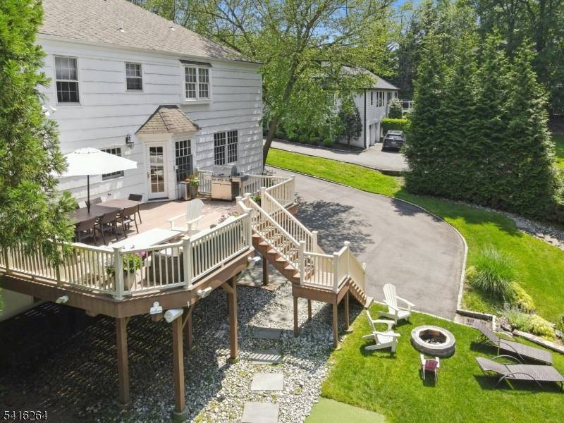 Nestled in one of Short Hills' most sought after neighborhoods, 77 Falmouth Street offers a rare opportunity to own a classic Center Hall Colonial set on.