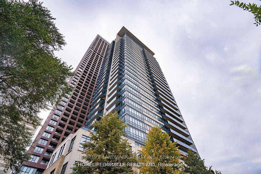 Luxurious Tridel's James Cooper Mansion, Amazing Layout Boasting Modern Open Concept Kitchen With Granite Centre Island.