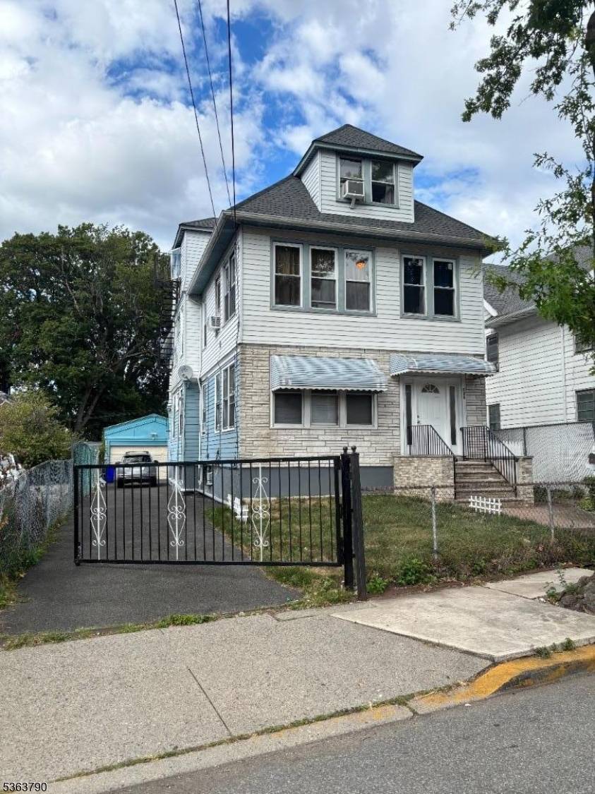 Legal 3 family house located in Paterson.