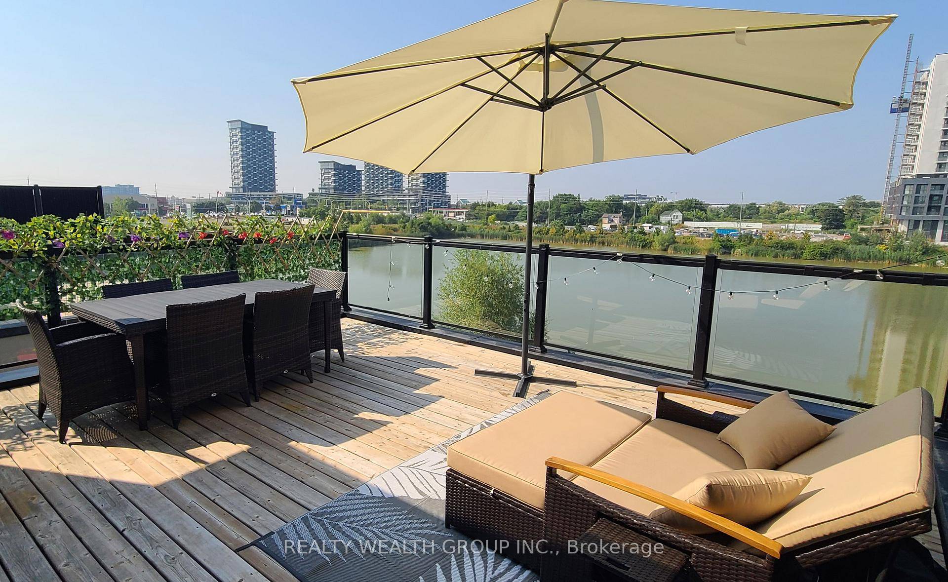 Rare end unit townhome boasting a spacious fourth bedroom family room and stunning pond views.