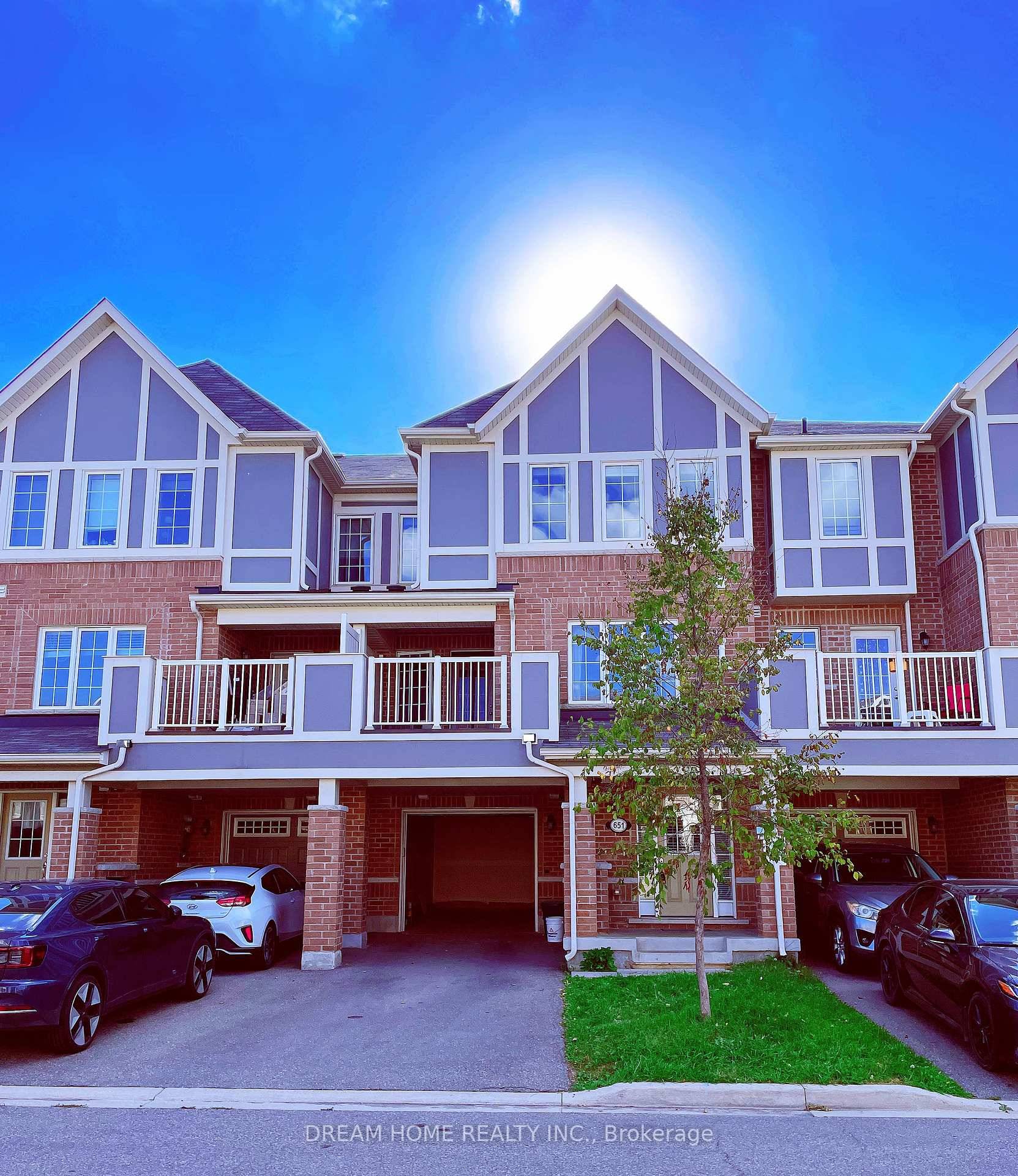 Stunning 3 storey freehold townhouse in Milton's family friendly Clarke neighborhood.