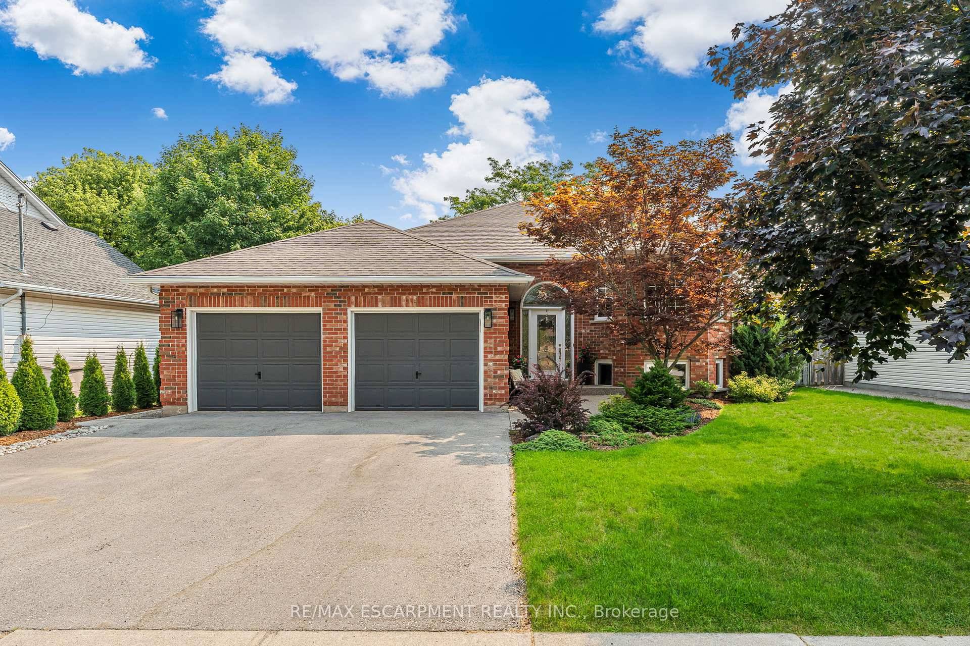 Experience elegance in this meticulously crafted 2 1 bungalow, offer 2416sf of luxurious living in Smithville's sought after south corridor.