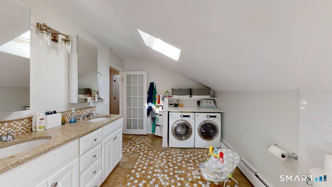 Rare East Rock gem this formerly owner occupied house offers renovated living, private parking, and unbeatable location.