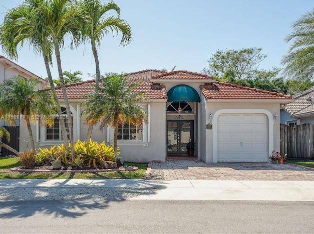 Welcome to this stunning Mediterranean style home in the highly desirable Bismark Homes at Venezia neighborhood of West Kendall.