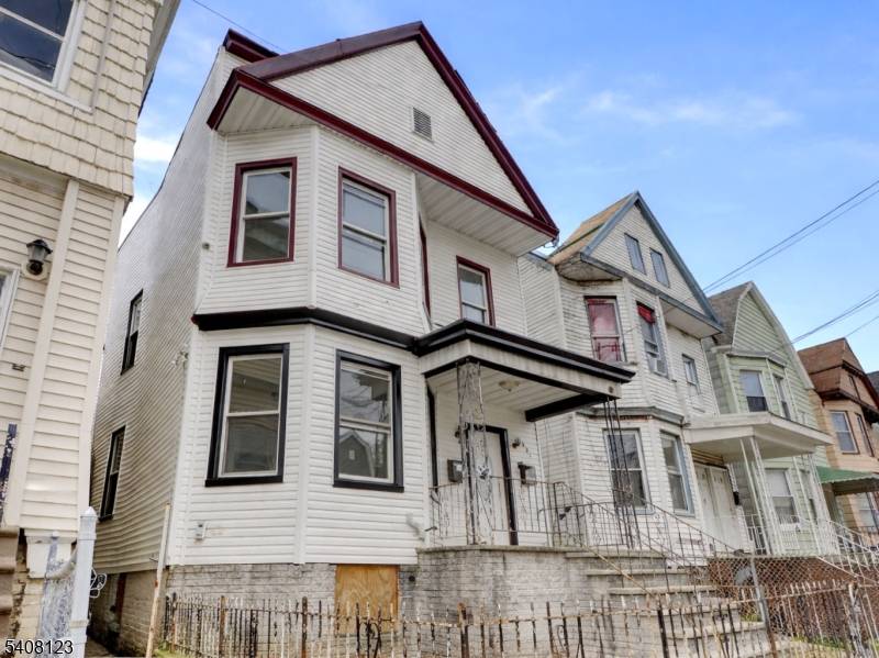 Charming 2 story two family home in the desirable Bayview Ave area of Jersey City.