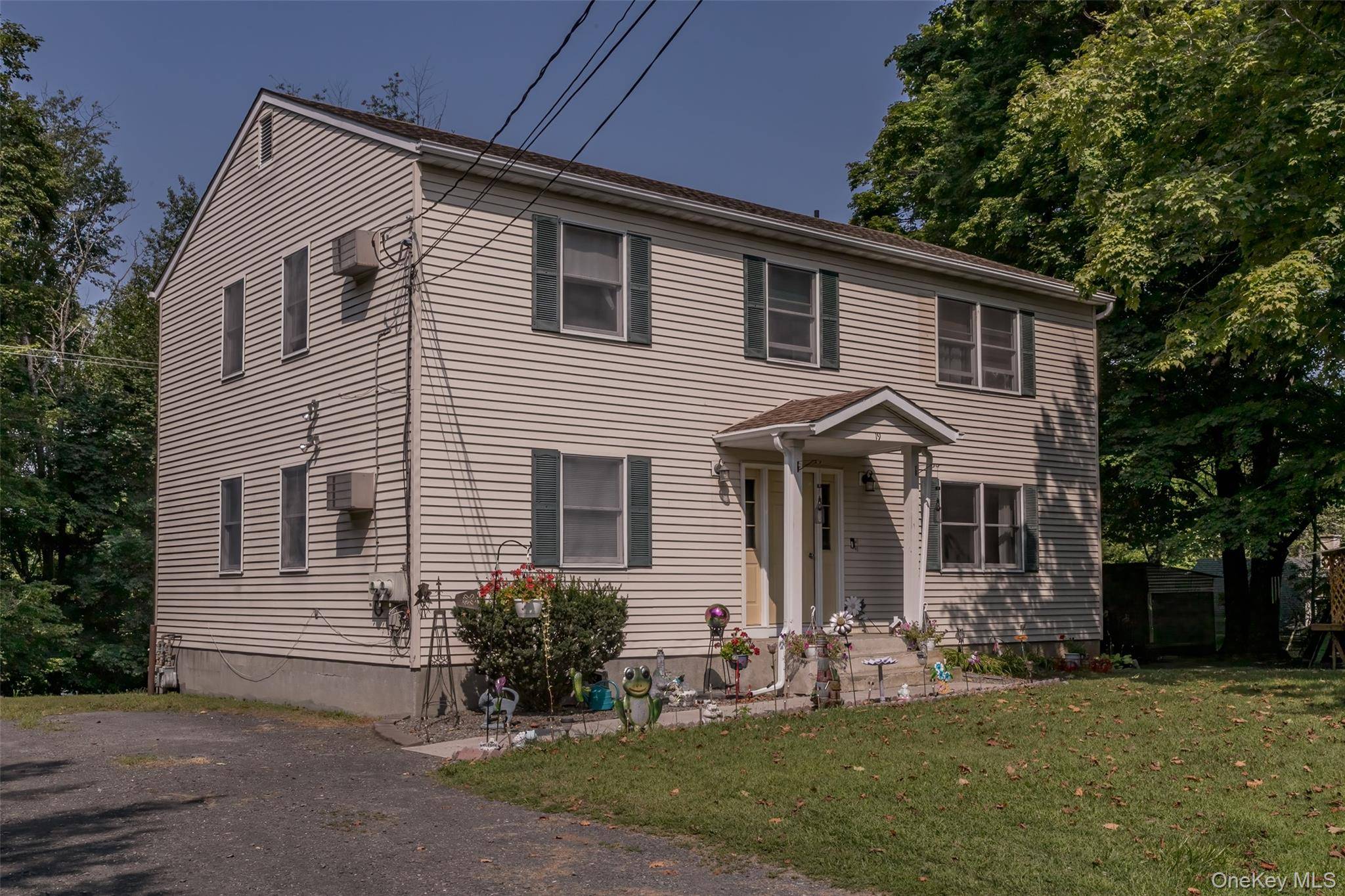 Step into a world of possibilities with this charming two family home, perfectly situated in the desirable Village of Florida.