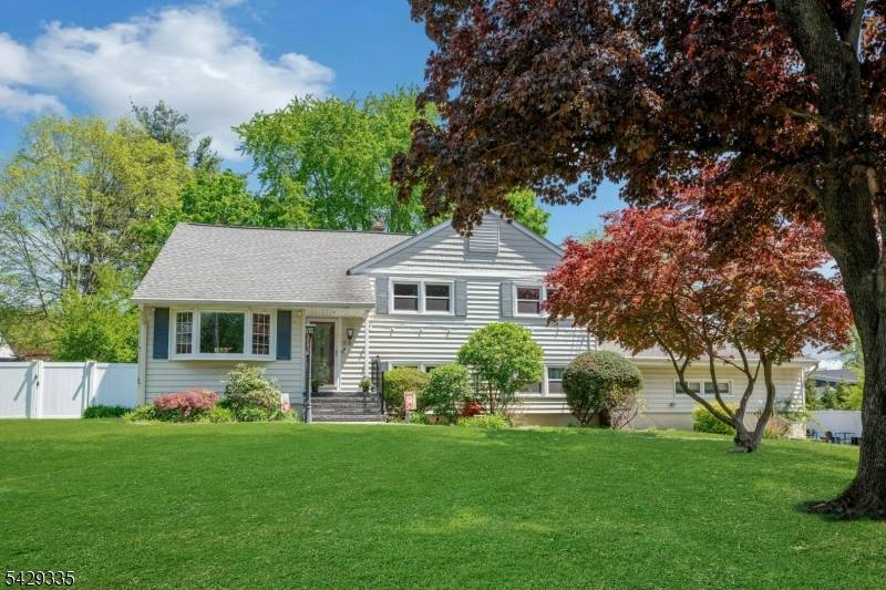Much larger than it looks, this multi level home offers something for everyone with lots of outdoor spaces to play and relax.