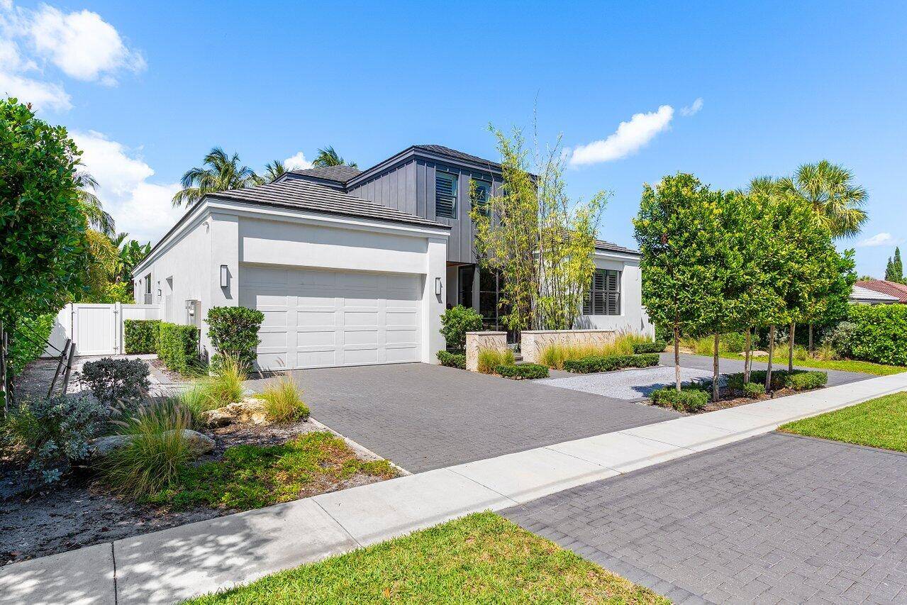 Modern Elegance in Boca Raton Custom Built Luxury LivingStep into refined South Florida living with this stunning custom built masterpiece located in East Boca Raton's Camino Lakes.