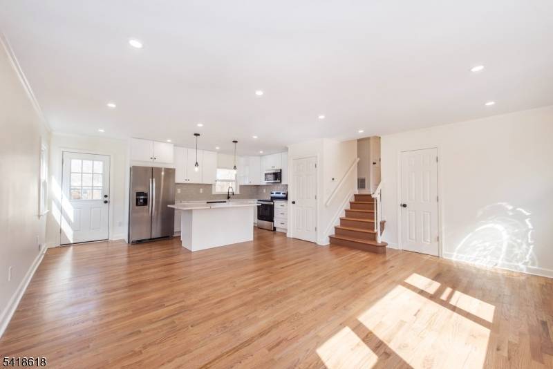 Beautifully renovated home in a prime Denville location, directly across from quiet park open land and just a short walk to vibrant downtown shops, restaurants, and school.