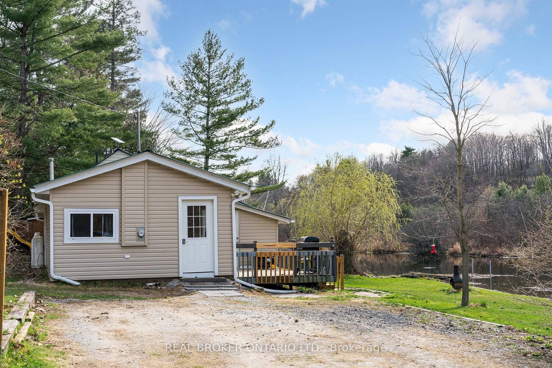 Welcome to 3385 Bolingbroke Road, a charming four season waterfront retreat in Maberly, Ontario.