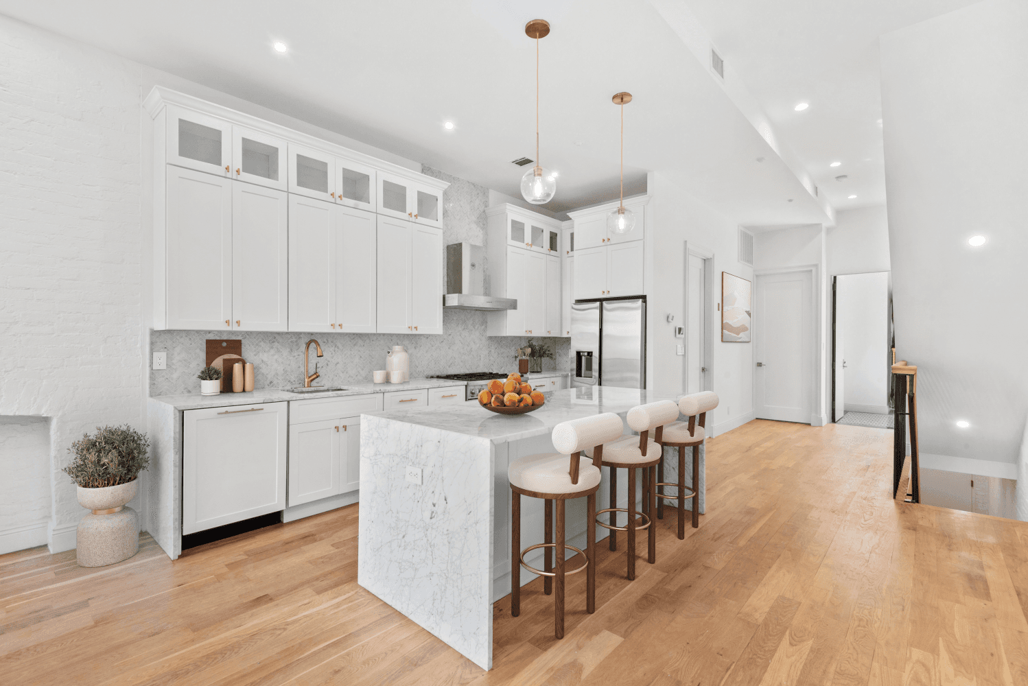 Tucked within a stately Harlem brownstone on a storied landmarked, tree lined street, this 2, 400 square foot triplex sanctuary blends timeless beauty with modern sophistication.