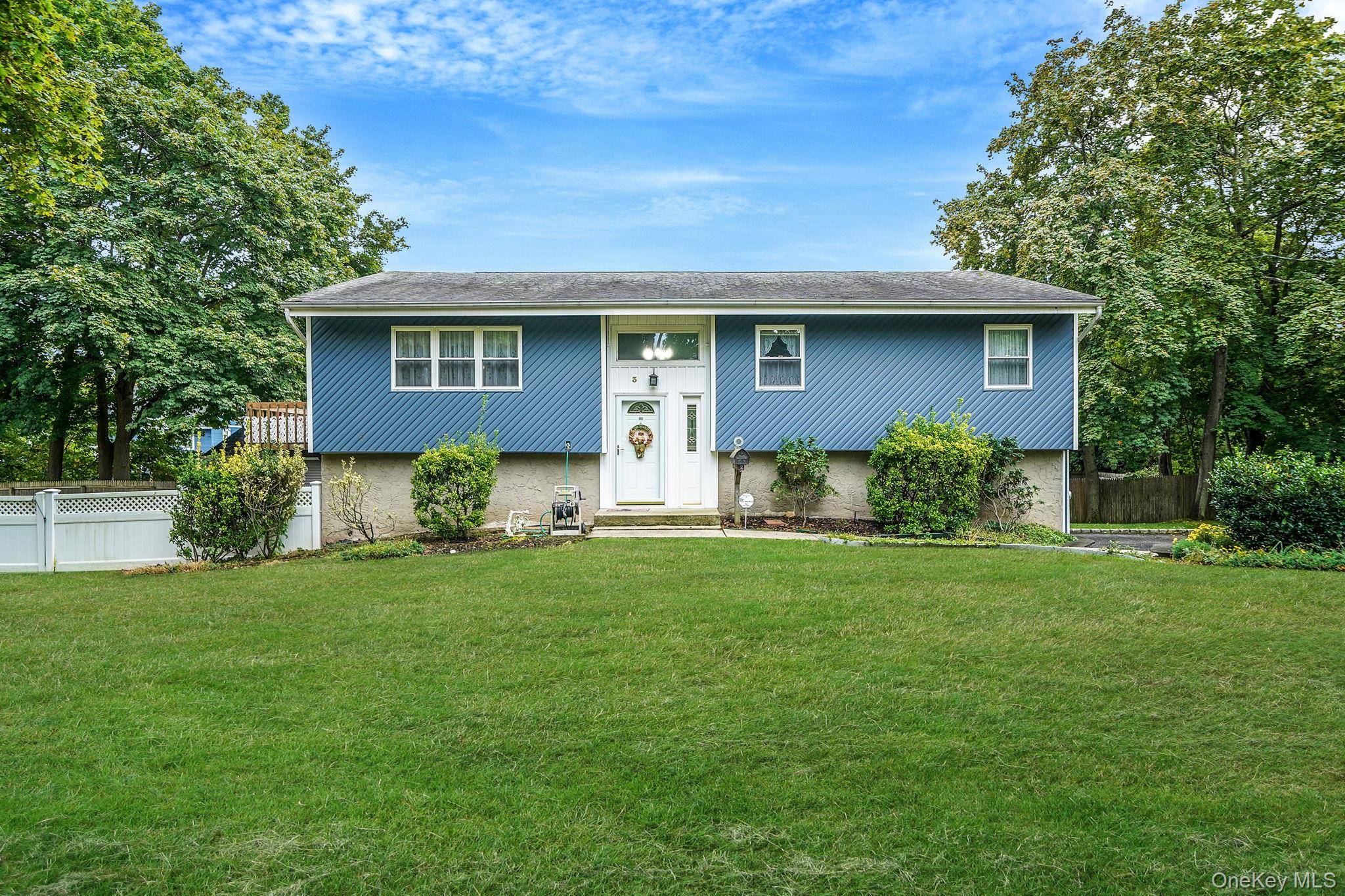 Welcome to this meticulously maintained home, nestled on a peaceful cul de sac in a beautiful Kings Park neighborhood.