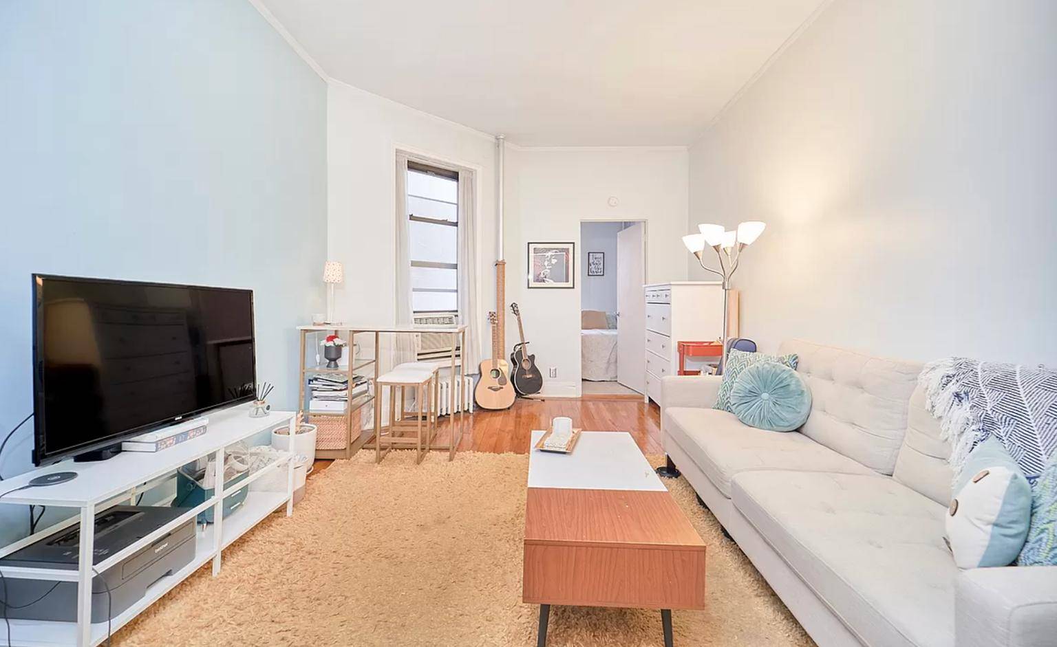 APARTMENT FEATURES DishwasherWalk through Kitchen with lots of cabinets and countertop spaceLarge ClosetTiled bathroom with tub showerHardwood FloorsHeat Hot water includedBuilding Neighborhood Laundry in BuildingResponsive ManagementSteps away to all tra