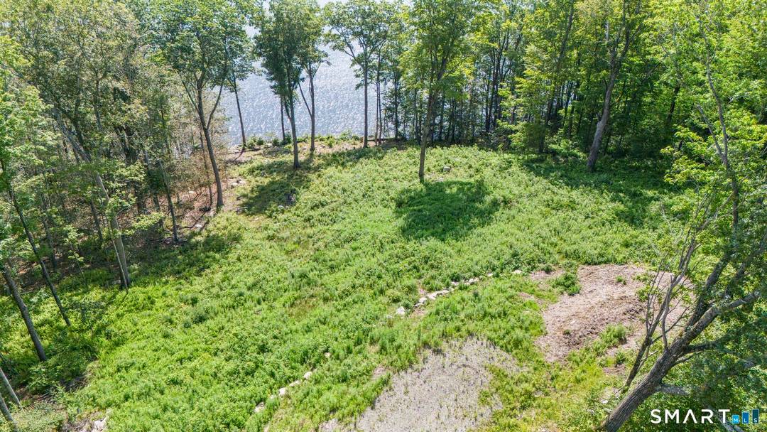 Set along the serene shores of Woodridge Lake, Lot 5 on Milton Road presents a rare opportunity to own a substantial piece of true waterfront in one of Litchfield County's ...