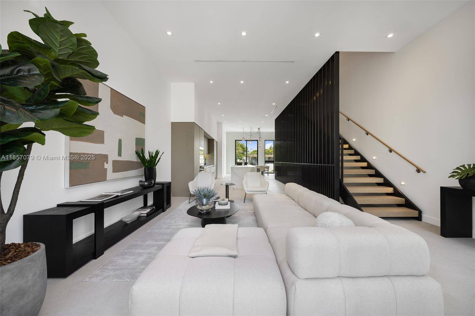 Award winning contemporary residence in The Roads Townhomes featuring a distinctive formed concrete fac ade.