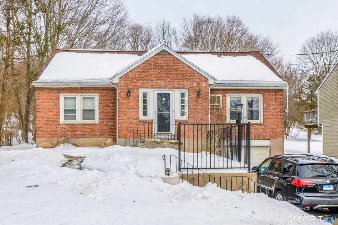 A solid brick side by side duplex set on a beautiful 1acre lot, offering two well kept 2 bedroom units with excellent versatility.