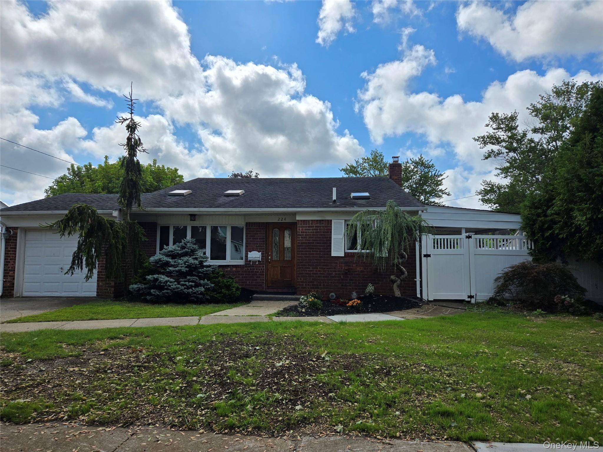 Must see this lovely 4 Bedroom, 2 Full Bath Front to Back Split level home.