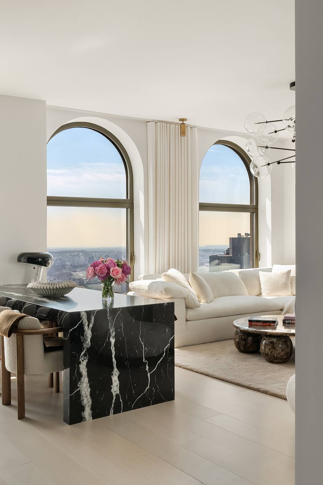 Set high above the city on the 55th floor of 130 William, this exceptional one bedroom, one and a half bath corner residence is wrapped in seven oversized windows with ...
