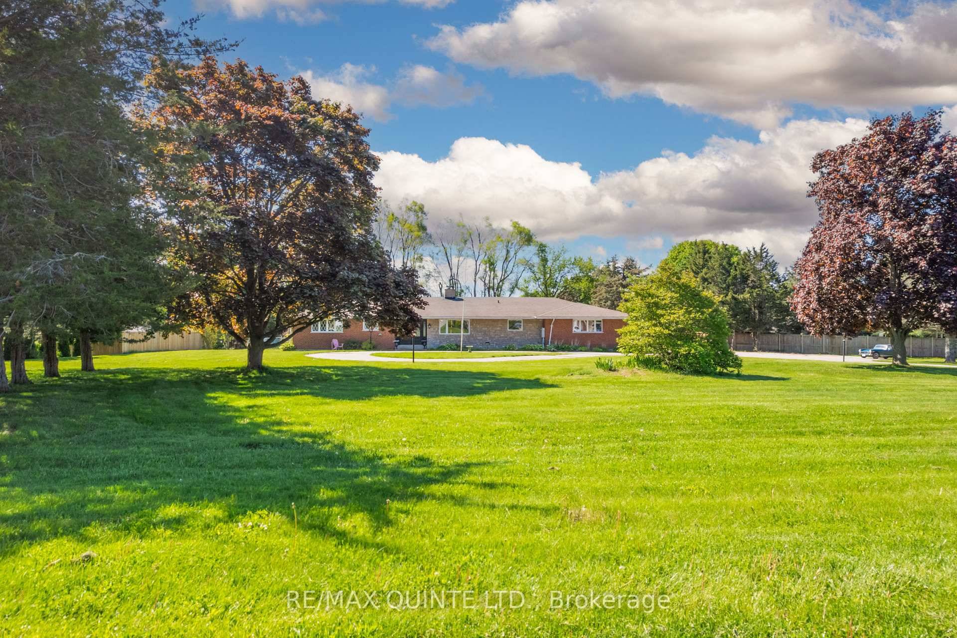 This rare and exceptionally located property consists of almost 2 acres in the heart of the constantly developing Town of Brighton.