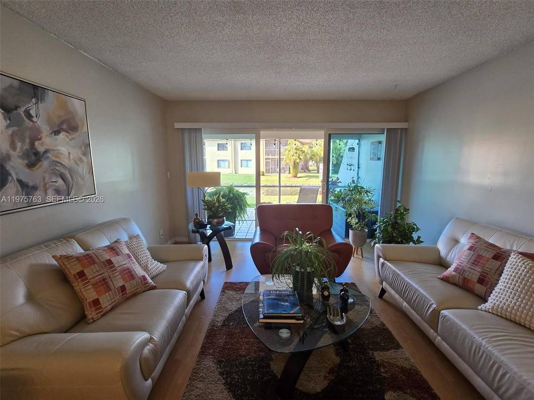 Beautiful direct canal views from this impeccably maintained first floor 2 bedroom, 2 bath residence.