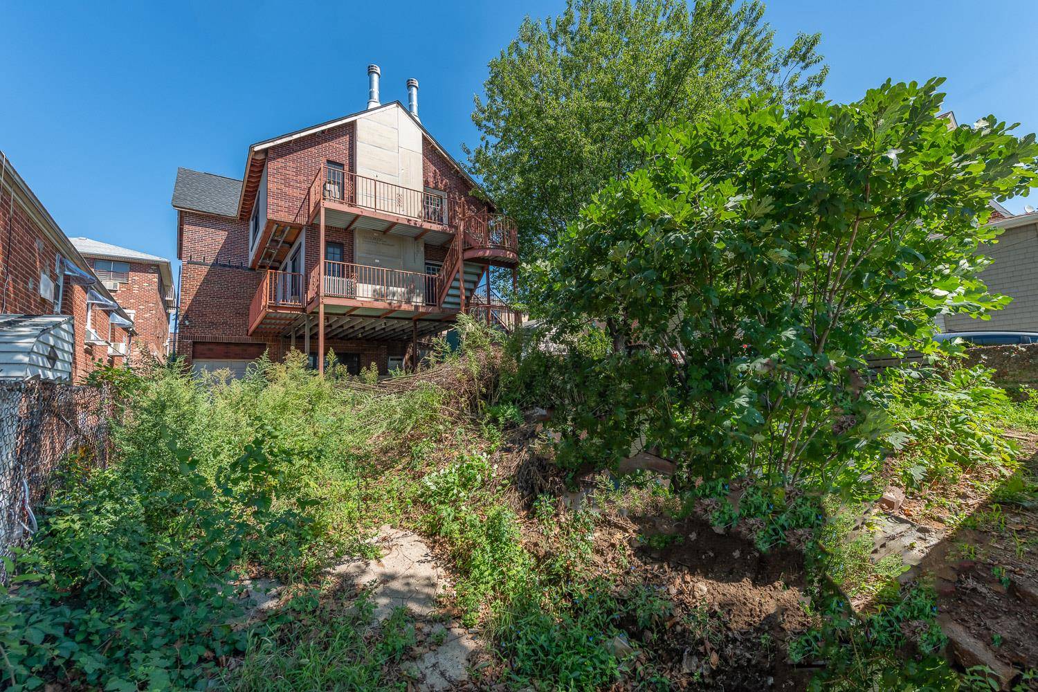 Exceptional 2 Family Home in Prime Maspeth Location Just Needs Your Finishing Touch !