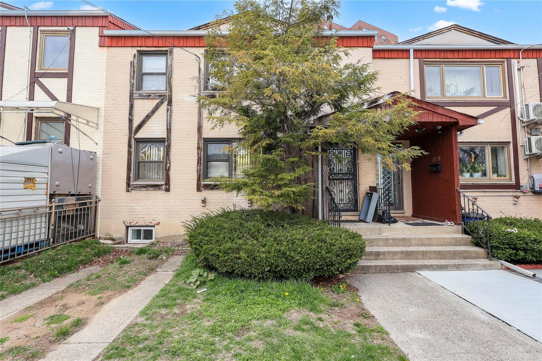 Vacant ! ! ! Presenting a very well maintained two family townhouse in the desirable Forest Hills neighborhood.