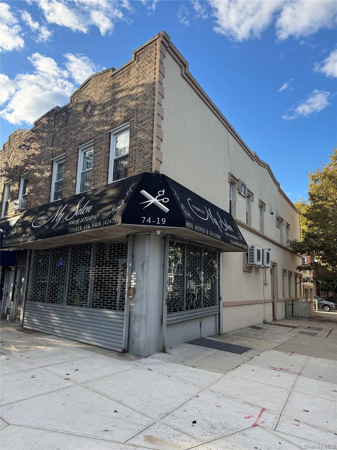 Introducing this well maintained, mixed use corner stucco and brick house with two apartments and a commercial space, with the added benefit of two separate garages.