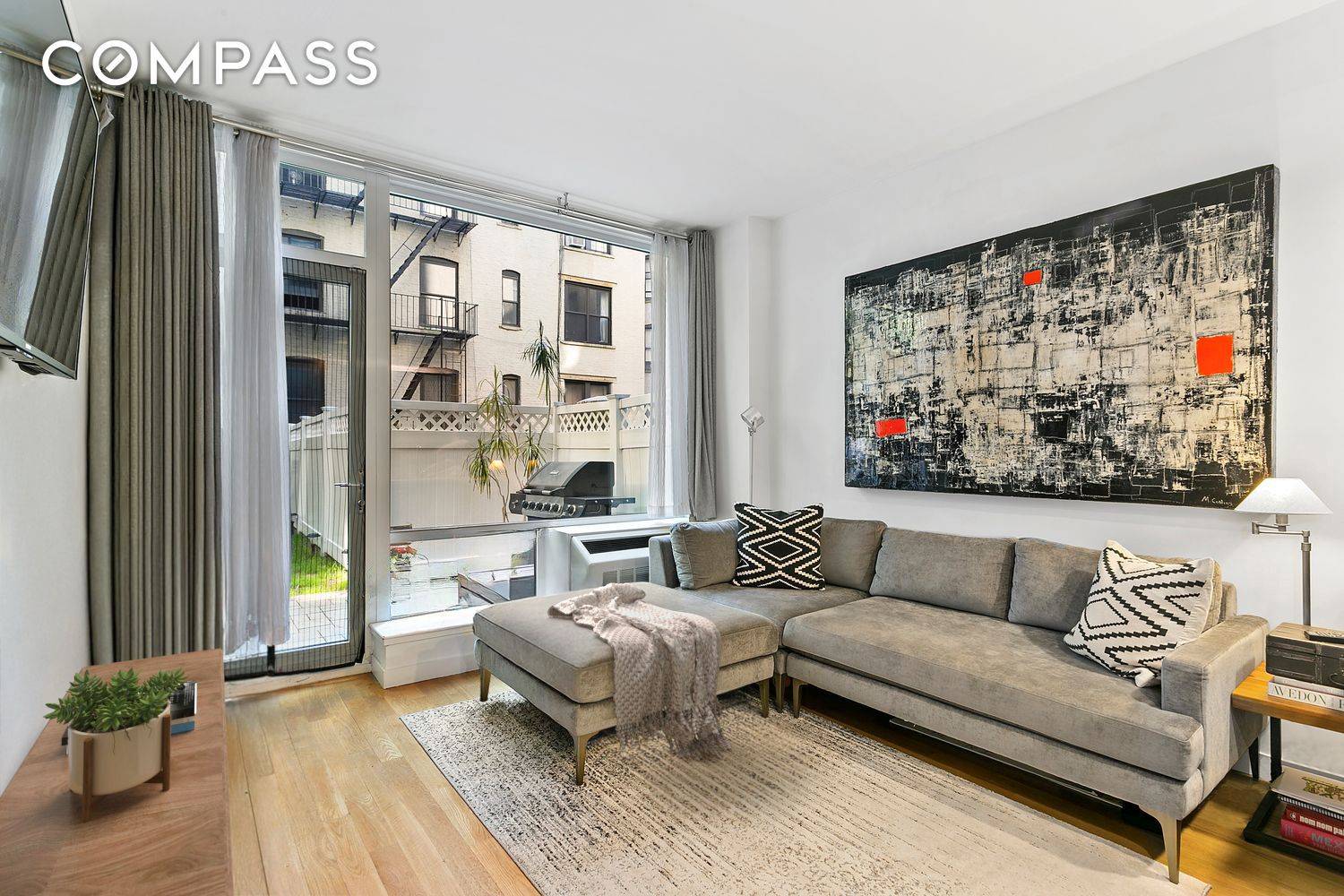 Welcome to 306 West 116th Street, Unit 1B an exquisite one bedroom condo with an oversized private back yard nestled in the heart of Harlem.