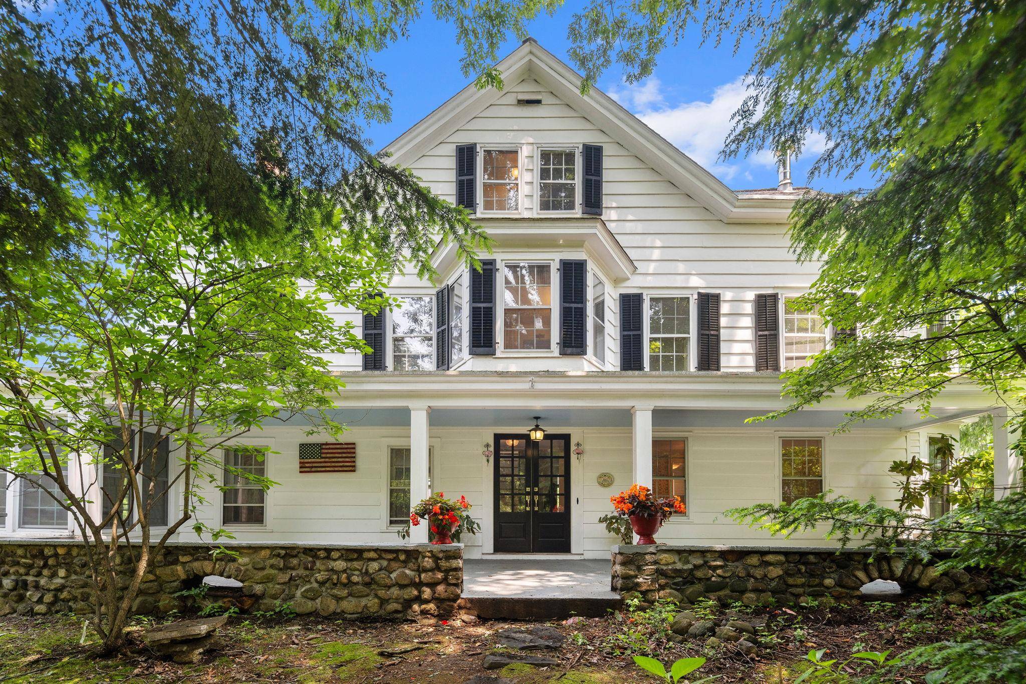 Set in the desirable Village of Pleasantville, this enchanting Colonial home, built in 1830 and sited on.