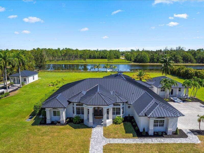 Welcome to one of the most scenic and sophisticated lakefront estate in Homeland.