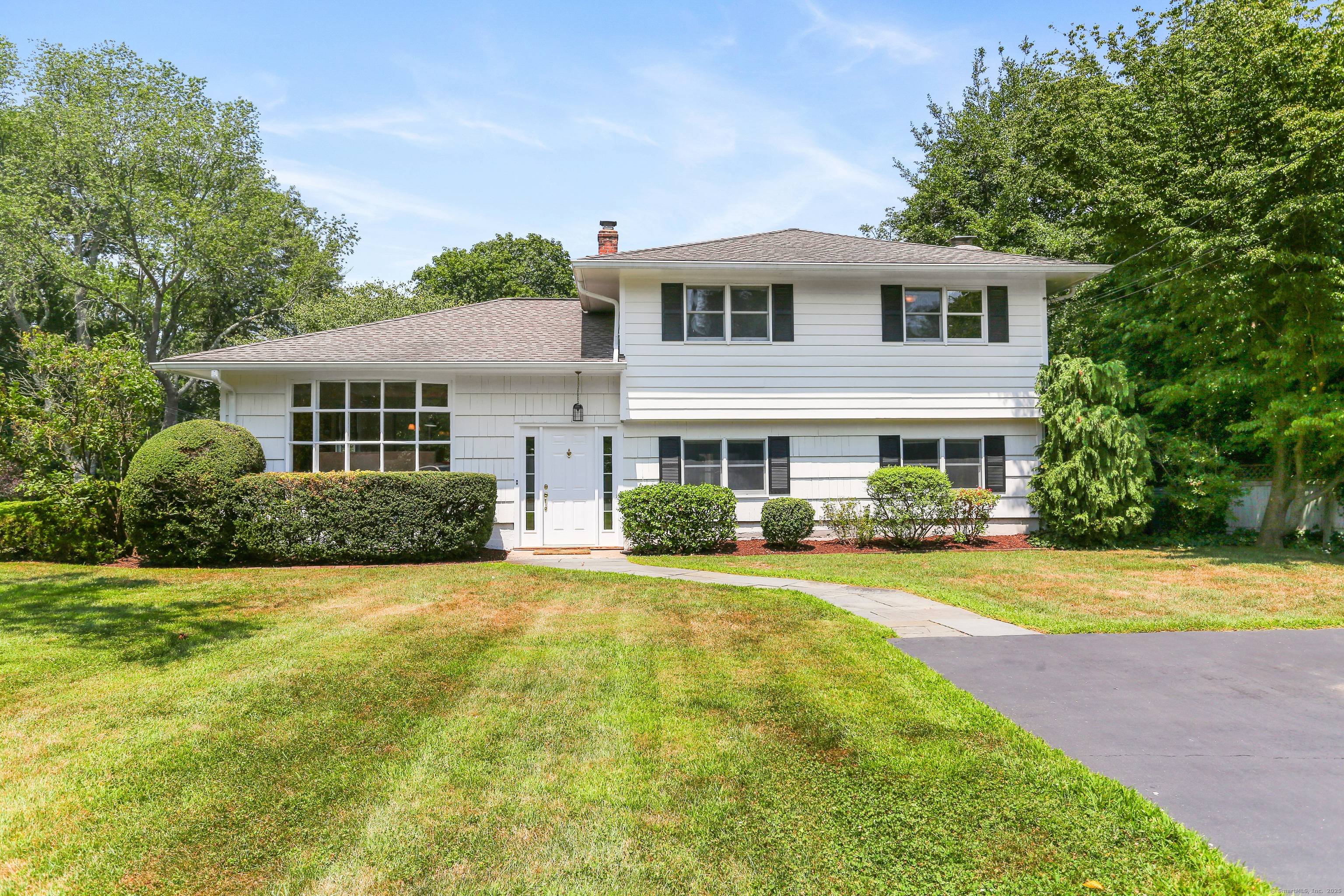 Located in a one of Westport's favorite neighborhood close to downtown Westport, schools, and commuter routes, this split level gem offers both character and practicality.