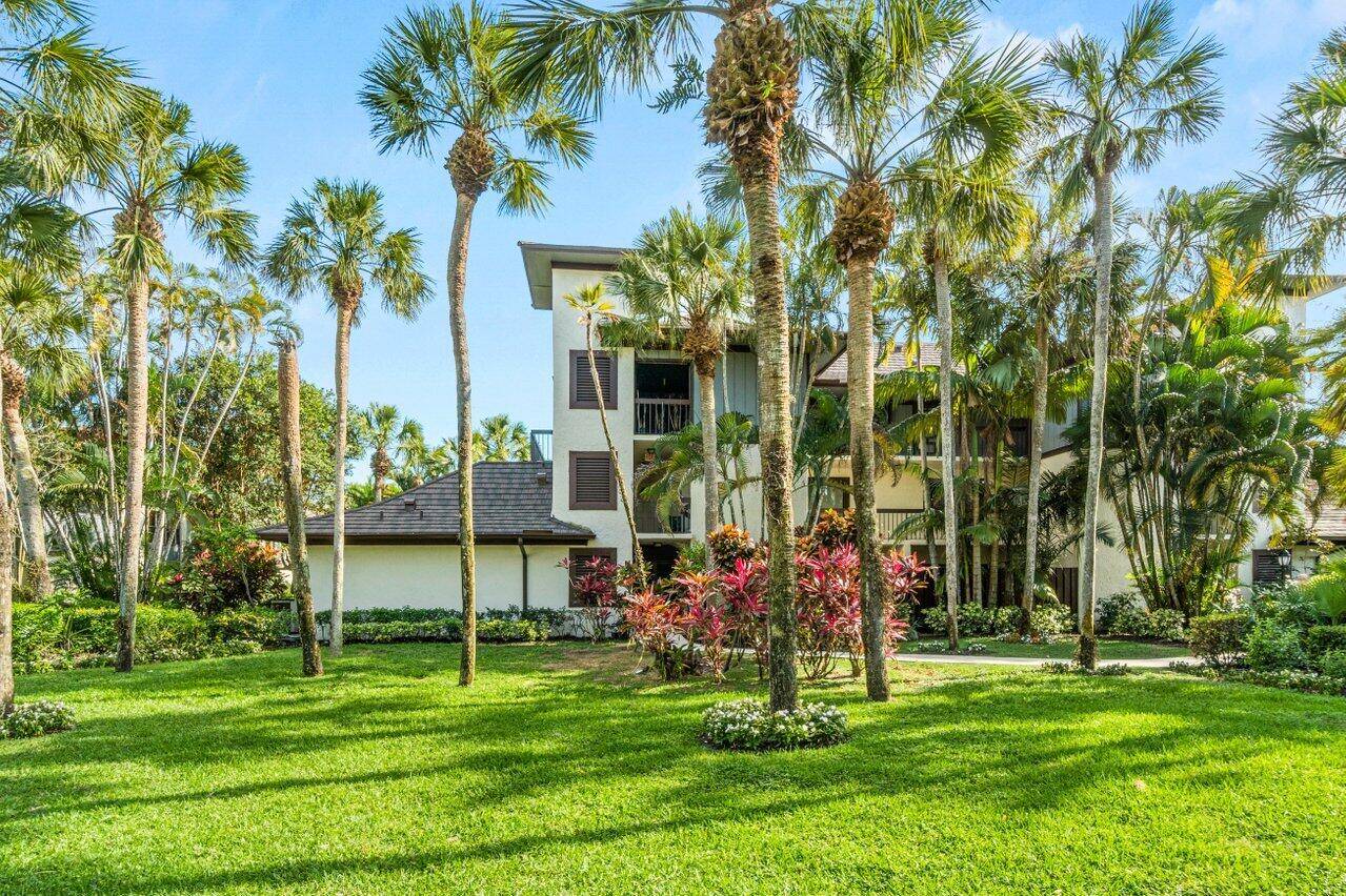 Welcome to this beautifully renovated ground floor residence located in the prestigious Palm Beach Polo Club.
