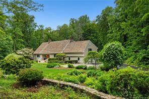 Prepare to be WOWED as you approach this exquisite Contemporary Cape set on beautiful 2 acre property on desirable South Wilton cul de sac.