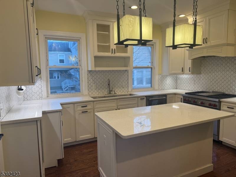 Step into timeless elegance with this charming and beautifully maintained 6 bedroom, 4 bath and powder room, Colonial, with easy access to NYC transportation and major highways.