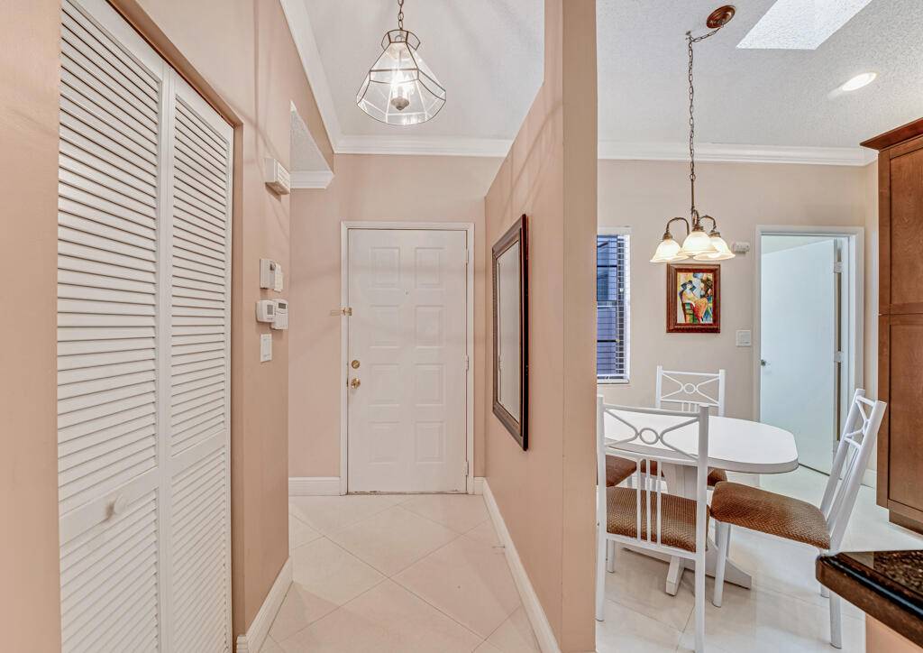This one is a Wow ! Enjoy living in this totally renovated villa w state of the art finishes !