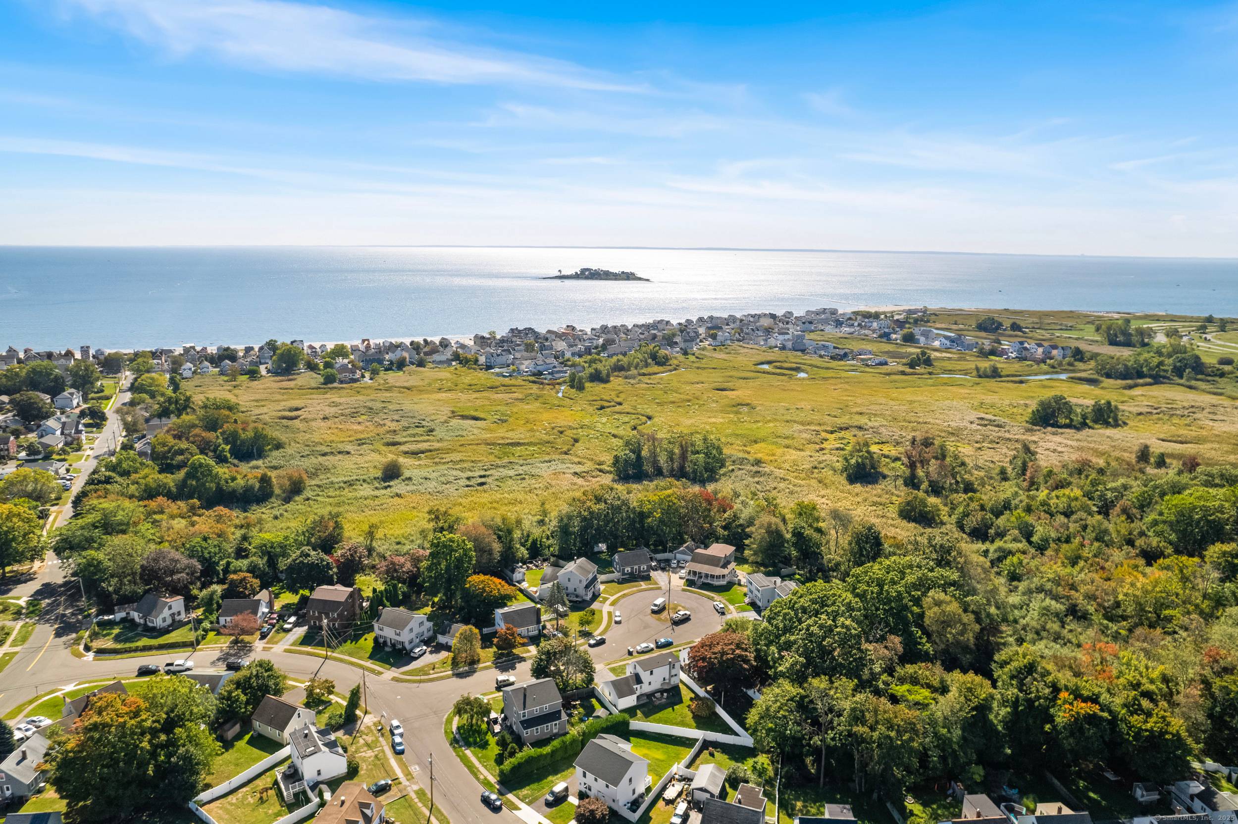 Location is key ! Live the beach life just steps from Silver Sands and Fort Trumbull Beach in this beautifully maintained Cape.