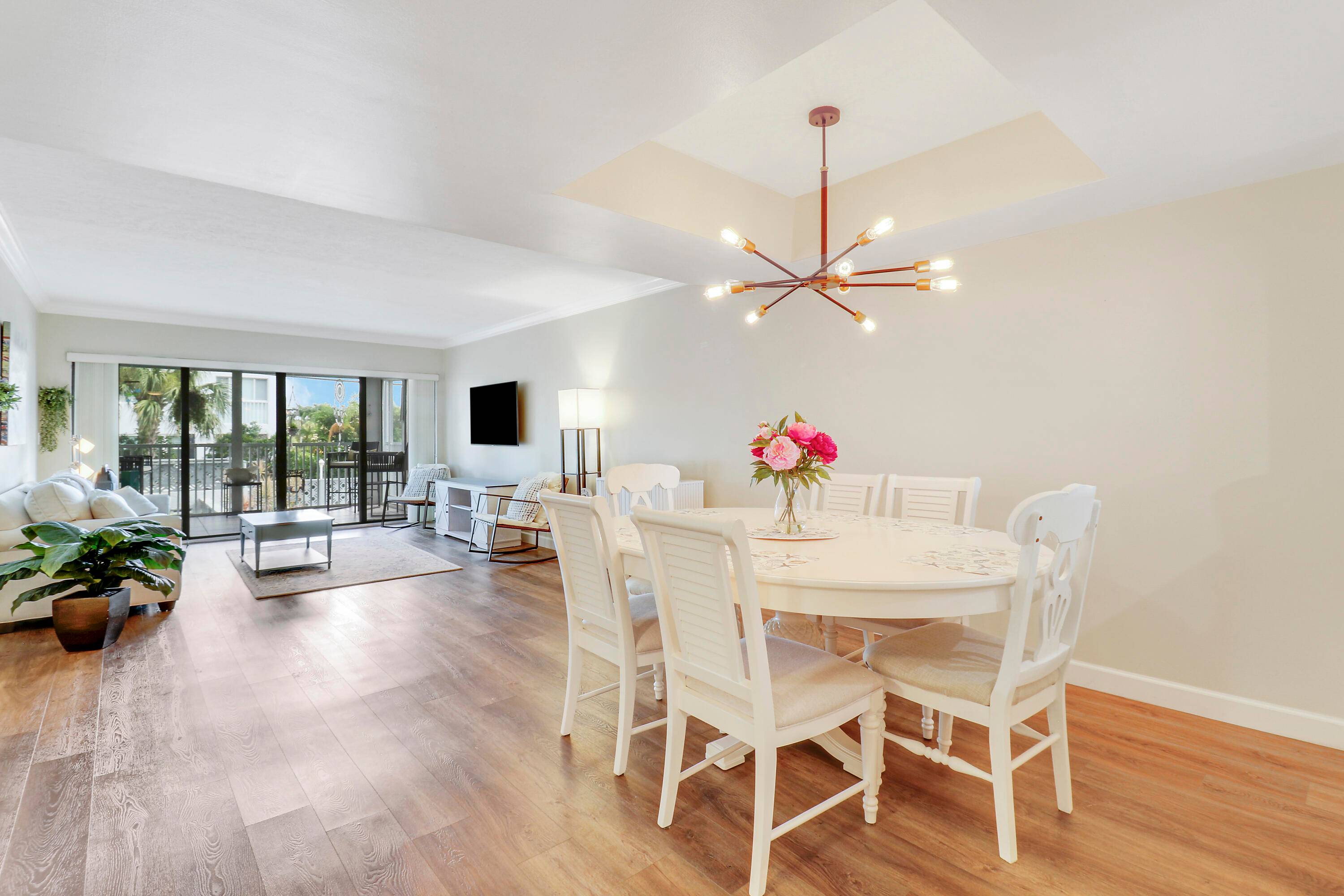 Wake up to serene marina views from your own patio in the heart of North Palm Beach !