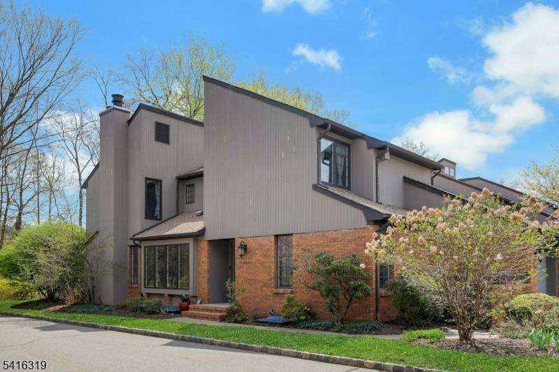 The absolute best location in Spring Brook Townhome Community this End unit enjoys both Golf Course views plus privacy located at the end of Keats Way.