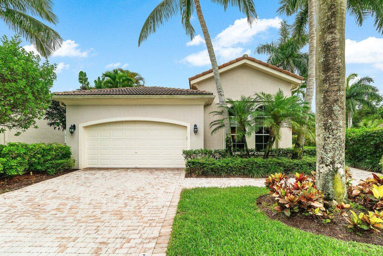 Experience the ease of Florida living at its best in this beautifully maintained 3 bedroom, 2.