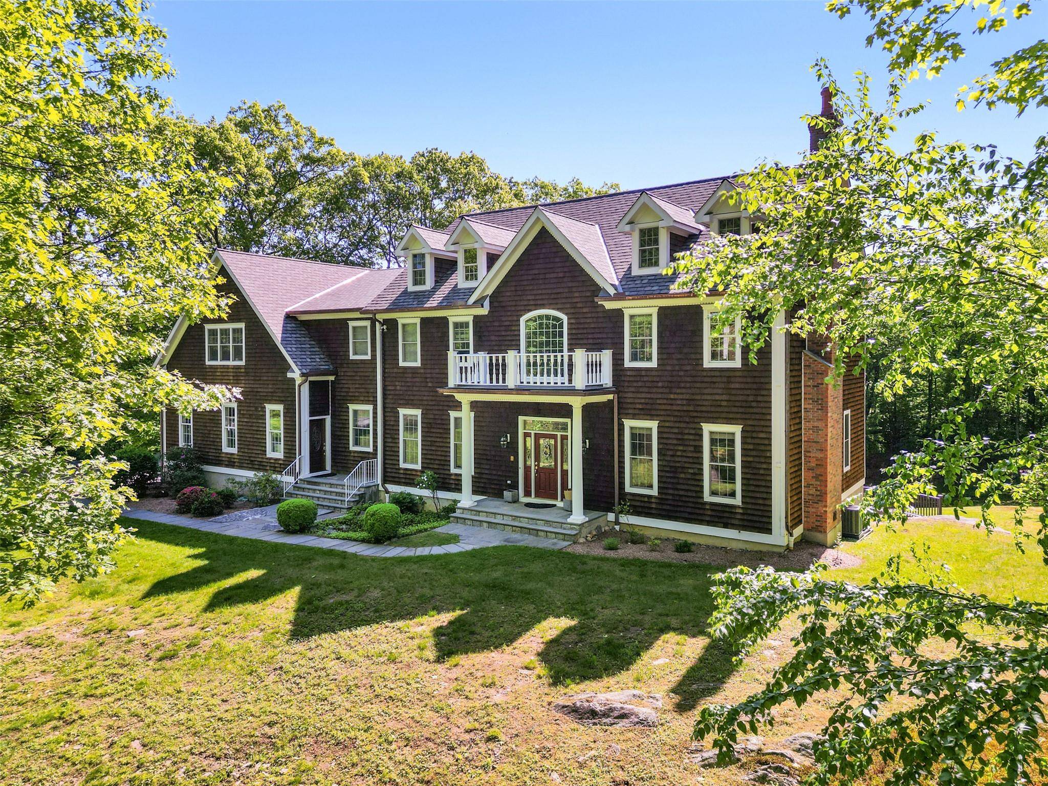 TOWERING OAKS Circa 2001 Country Colonial with fabulous open floorplan.