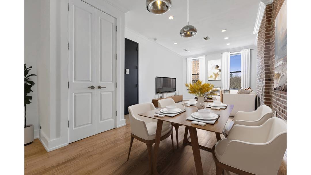 Experience luxurious penthouse living in an elegant boutique brownstone at 506 East 119th Street.