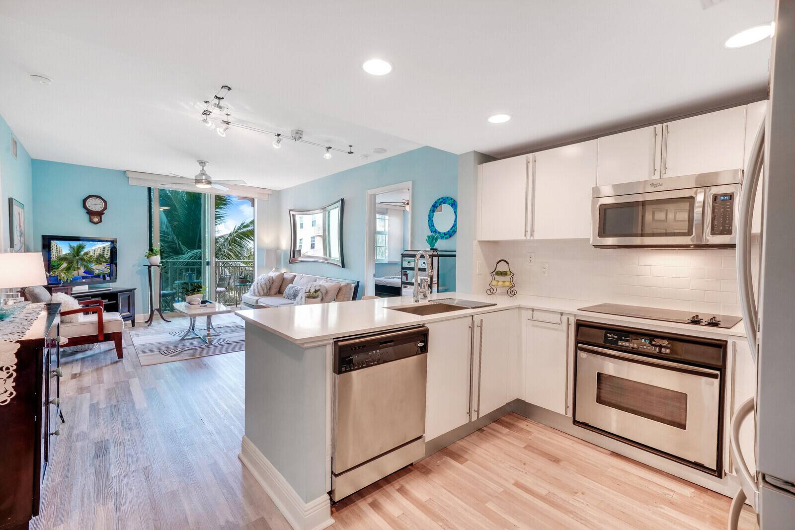 Recently renovated Total overhaul completed at the end of 2022, including a brand new kitchen with white Calcutta granite countertops, stainless steel refrigerator, and click lock laminate flooring.