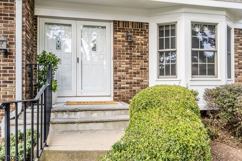 Move right into this immaculate townhome, ideally situated on a premium lot in the Barons at Basking Ridge.