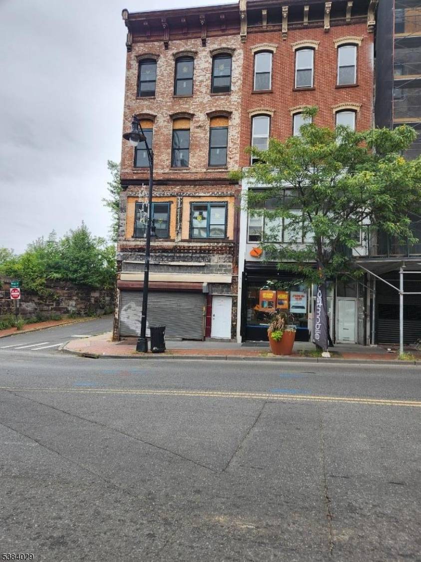 Prime mixed use property featuring two buildings front building 4 stories, rear building 3 stories ideally located across from NJ Transit train station with a NYC bus stop at the ...