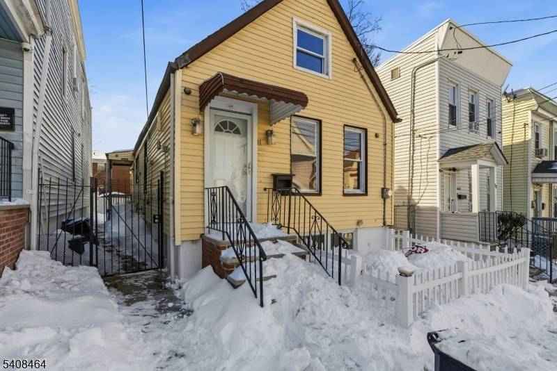 Renovated in 2025, this fully updated Cape Cod style home offers 4 bedrooms and 3 full bathrooms with a finished walk out basement.